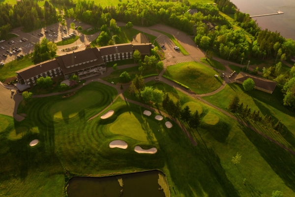 Aerial view of Mill River Resort in summer